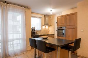 Appartement Central et Gare + Garage : photos des chambres