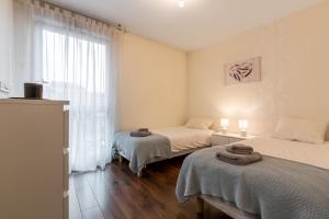 Appartement Central et Gare + Garage : photos des chambres