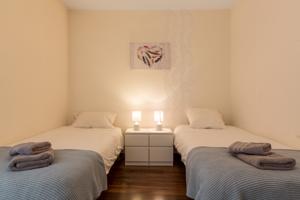 Appartement Central et Gare + Garage : photos des chambres