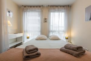 Appartement Central et Gare + Garage : photos des chambres
