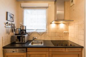 Appartement Central et Gare + Garage : photos des chambres
