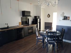 Le Chat Vert - Appartements : photos des chambres