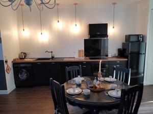 Le Chat Vert - Appartements : photos des chambres