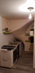 Appartement Cosy Small House : photos des chambres