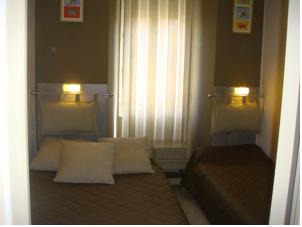Hotel de l'Ariana : Chambre Triple Classique