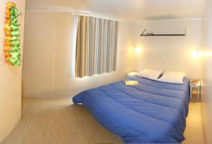 Hebergement Camping Le Bois Fleuri : photos des chambres