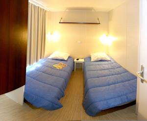 Hebergement Camping Le Bois Fleuri : photos des chambres