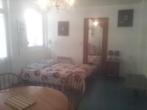 Appartement Au Relais Des Thermes : photos des chambres
