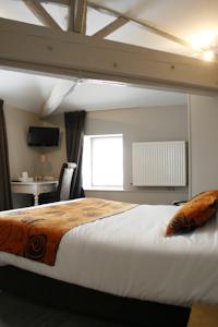 Hotel Logis Hostellerie de l'Abbaye : photos des chambres