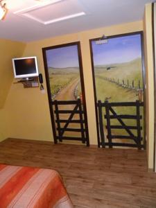 Hotel Mille et une Nuits d'Aubrac : Chambre Quadruple Été Aubrac