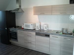 Appartement - Au Vieux Moulin : photos des chambres