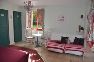Chambres d'hotes/B&B Aux Gourmandises : photos des chambres