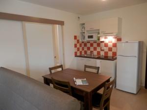 Hebergement Vacanceole - Residence Le Clos du Rocher : photos des chambres