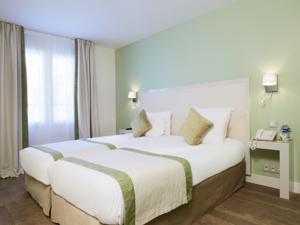 Hotel Kyriad Paris 18 - Porte de Clignancourt - Montmartre : photos des chambres