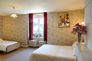 Hotel Logis Hostellerie Du Cheval Blanc : photos des chambres