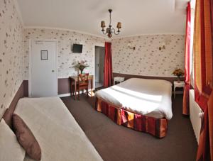 Hotel De La Plage : photos des chambres