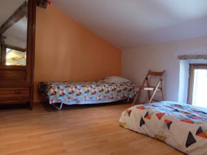 Appartement Ailleurs : photos des chambres