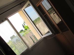 Appartement Maison Tifaloc : photos des chambres
