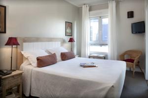 Hotel De La Paix Montparnasse : photos des chambres