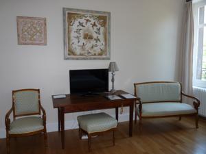 Chambres d'hotes/B&B Chambres d'Hotes Cote Parc-Cote Jardin : photos des chambres
