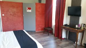 Les Aubuns Country Hotel : photos des chambres