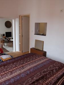 Appartement Ailleurs : photos des chambres