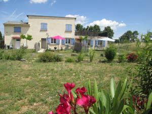 Appartement Maison Tifaloc : photos des chambres