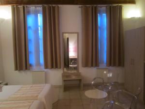 Hotel La Taverne : photos des chambres