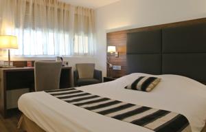 Hotel Kyriad Bordeaux Ouest - Merignac Aeroport : photos des chambres