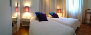 Appartements Centre Ville - Parking : photos des chambres