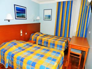 Auberge de jeunesse Antares hostel : Chambre Triple