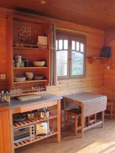 Hebergement La Roulotte d'Alcas : photos des chambres