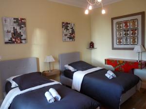 Chambres d'hotes/B&B Chambres d'Hotes Cote Parc-Cote Jardin : photos des chambres