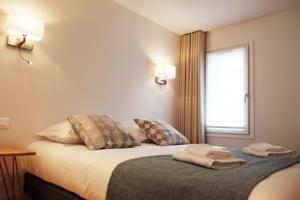 Appartement Jardin Saint Honore Apartments : photos des chambres