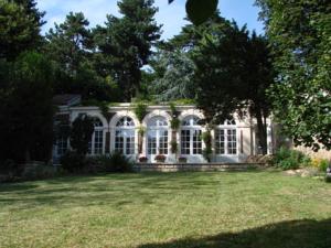 Appartement L'Orangerie White-Palacio : photos des chambres