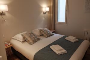 Appartement Jardin Saint Honore Apartments : photos des chambres