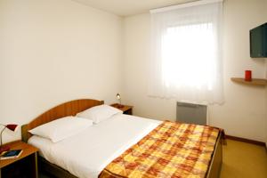 Hebergement Sejours & Affaires Geneve Saint Genis : photos des chambres