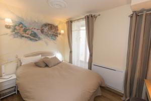 Appartement T2 centre ville clim et parking : photos des chambres