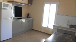 Appartement T2 dans maison de village : photos des chambres