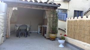 Appartement T2 dans maison de village : photos des chambres