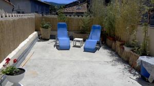 Appartement T2 dans maison de village : photos des chambres