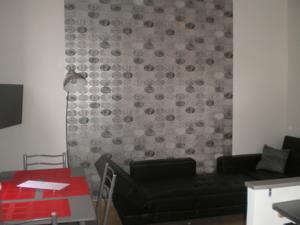 Appartement Quatre a troyes : photos des chambres