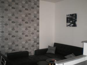 Appartement Quatre a troyes : photos des chambres