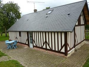Hebergement Holiday Home Au coeur des Pommiers : photos des chambres