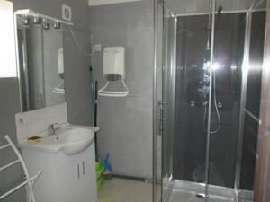 Appartement Maison Tifaloc : photos des chambres