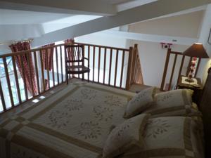 Appartement L'Orangerie White-Palacio : photos des chambres