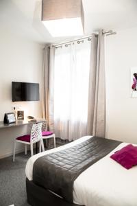 Hotel De La Pommeraie : photos des chambres