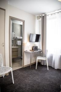 Hotel De La Pommeraie : photos des chambres