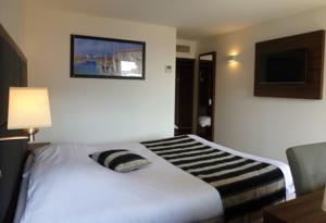 Hotel Kyriad Bordeaux Ouest - Merignac Aeroport : photos des chambres
