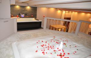 Appartement Loft avec spa privatif : photos des chambres